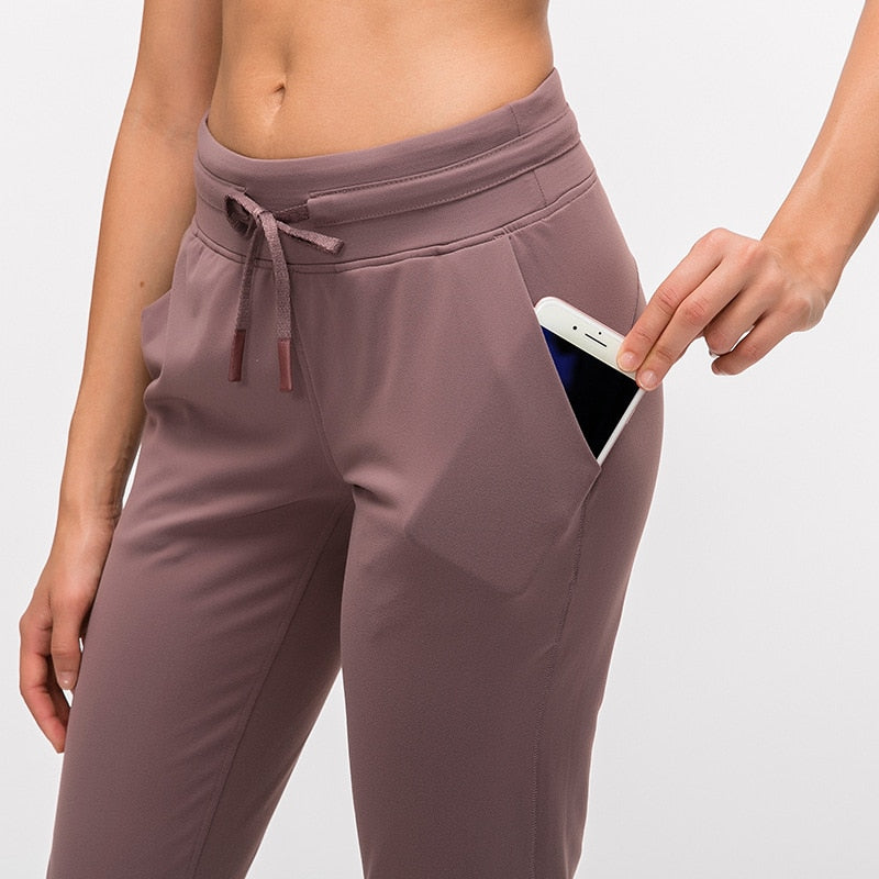 Lunéa Joggers Deportivos Mujer con Bolsillo Lateral Transpirable Running Fitness