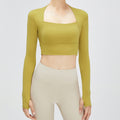 Two sets of fitness clothes with a shawl, a chest pad, a women's cloud-like top, a long-sleeved T-shirt, and a U-shaped shock-absorbing yoga suit